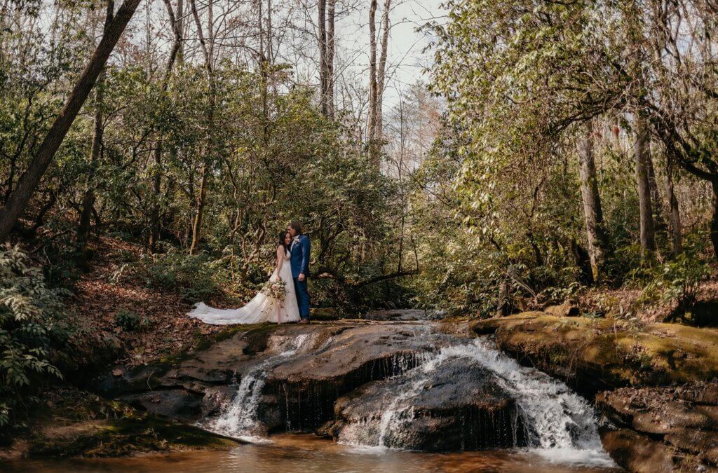 Elopement over a river waterfall